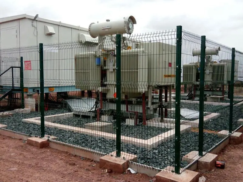 Outdoor transformer fenced area showing clearance and maintenance access planning