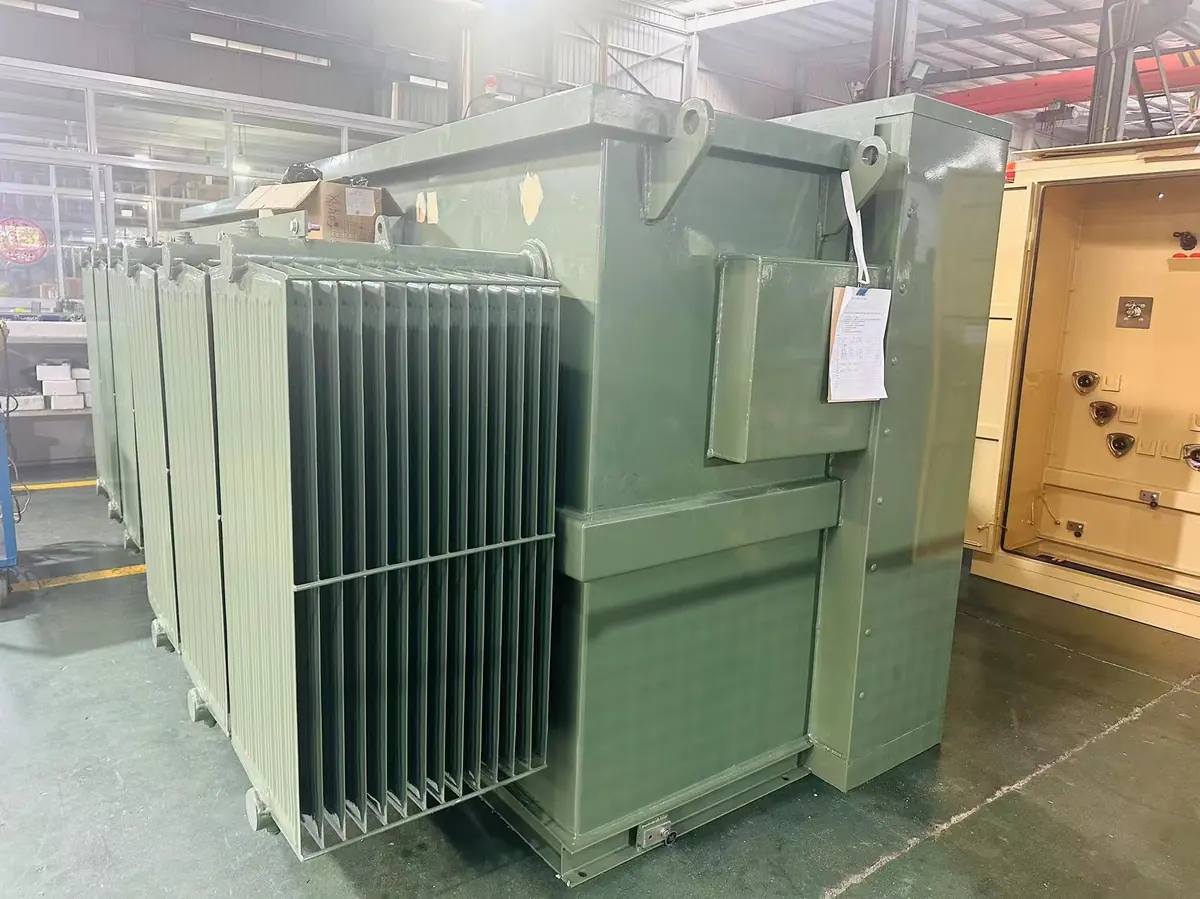 Pad mounted transformer side view showing cooling fins and tank structure