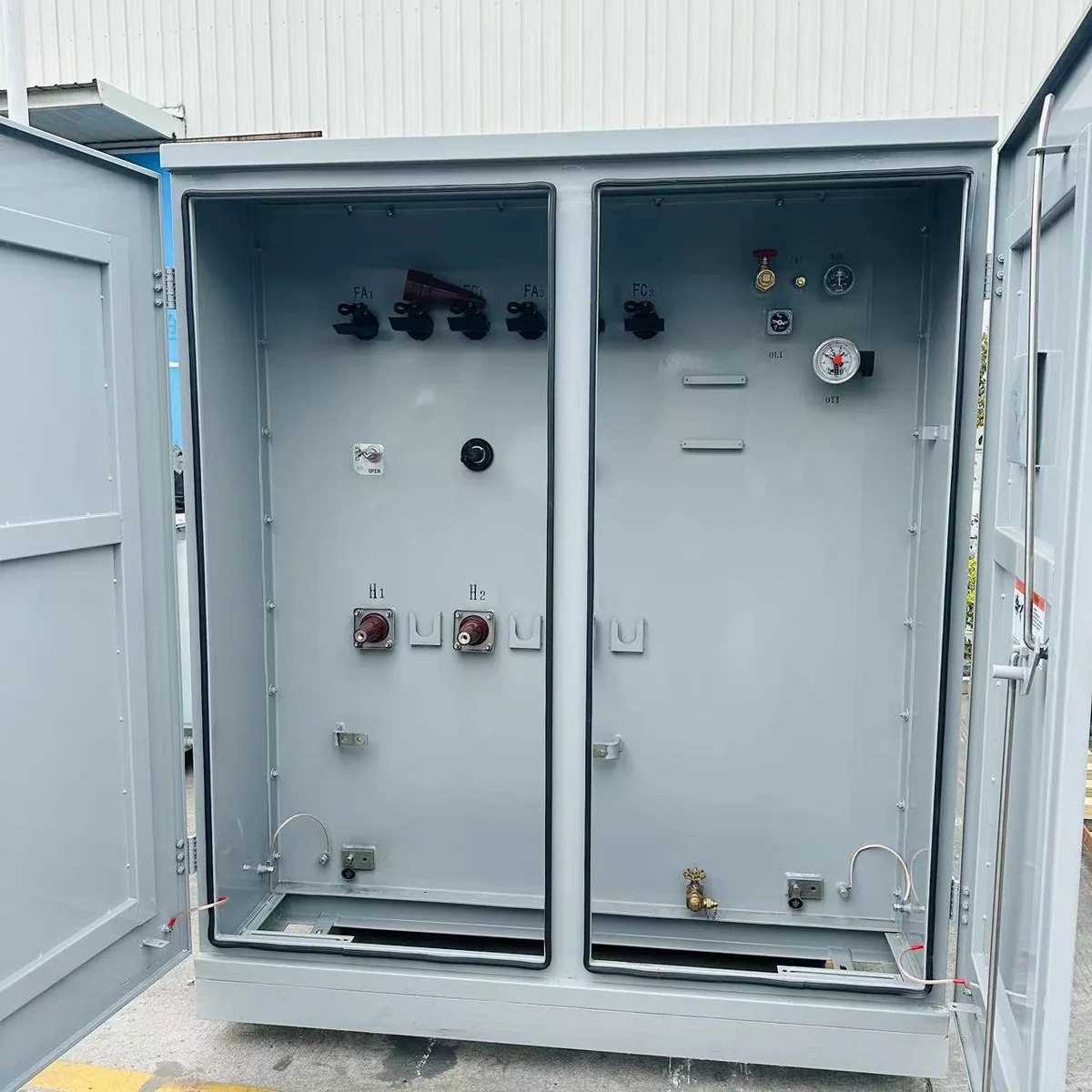 Pad mounted transformer compartments showing high voltage and low voltage sections for technical data sheet and RFQ configuration review